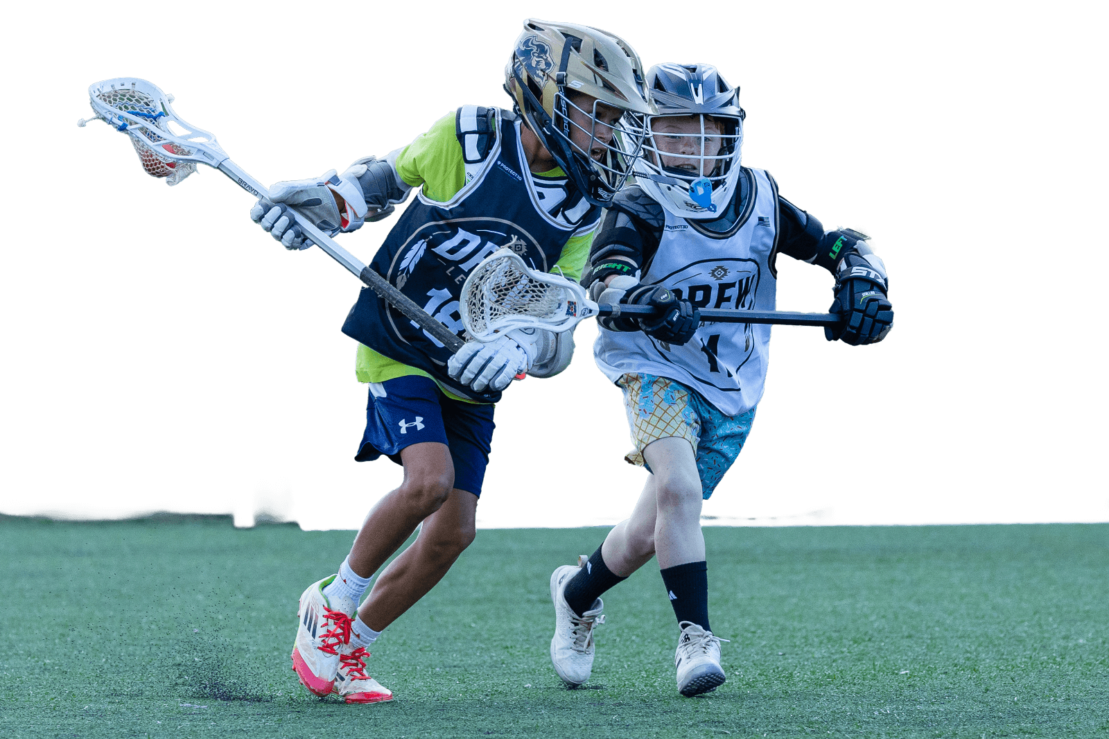 Two youth lacrosse players battling for the ball